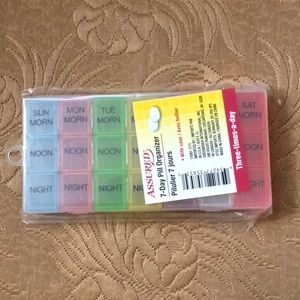 Fits Right in Your Hand Bag 7 Day Pill Organizer.